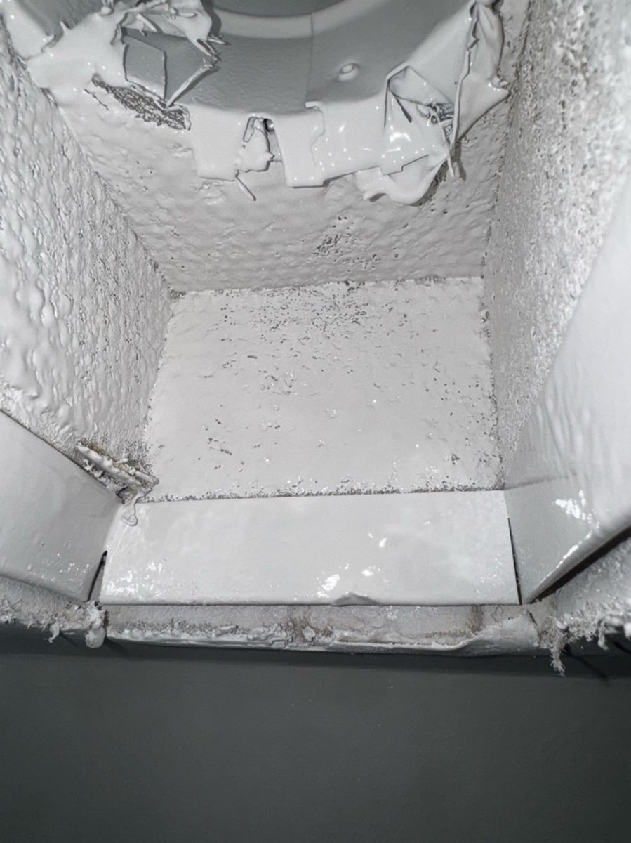The same duct interior clean and bright after professional coating