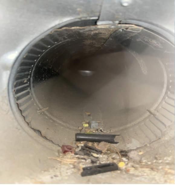Dusty air vent before professional air duct and AC cleaning in South Florida